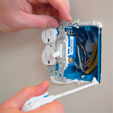 air sealing around electrical boxes|how to seal electrical outlets.